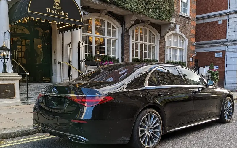 First Class chauffeur — Mercedes-Benz S-Class at The Goring London Black Mercedes-Benz S-Class First Class chauffeur car outside The Goring hotel Belgravia London — Chauffeurz VIP fleet